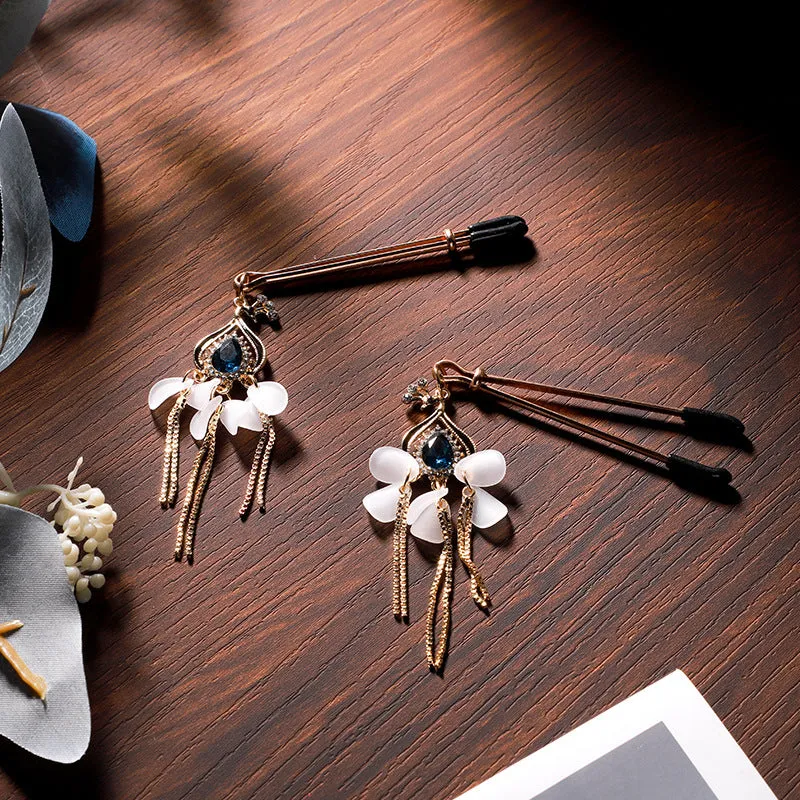 Gold Nipple Clamps with Blue Gemstone Pendants
